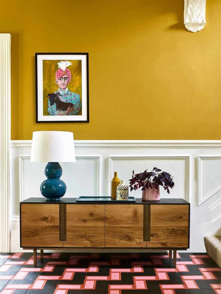Decorative floor tiles in a bright hallway