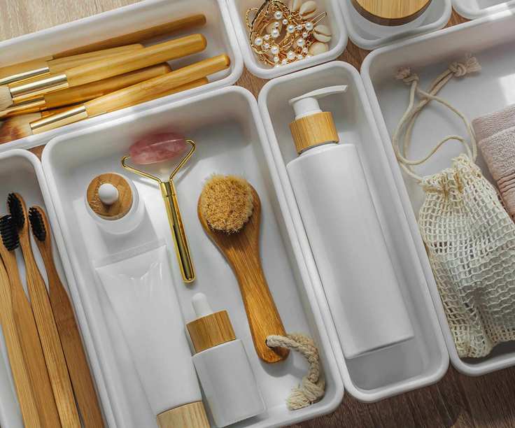 Several acrylic bathroom drawer organizers
