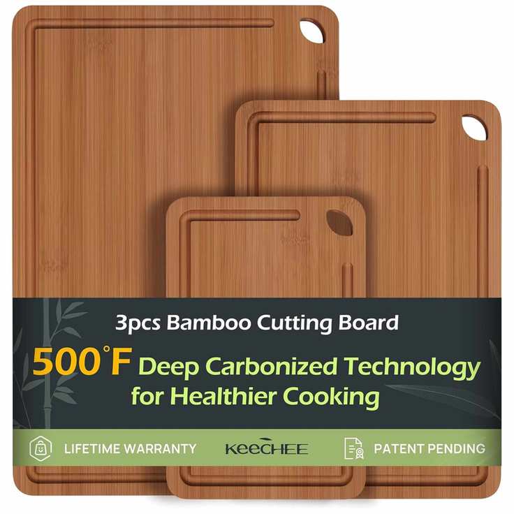 A set of three rectangular bamboo cutting boards in various sizes