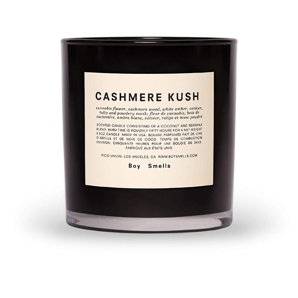 Boy Smell's Cashmere Kush candle in a dark, tinted glass jar with the label on the front