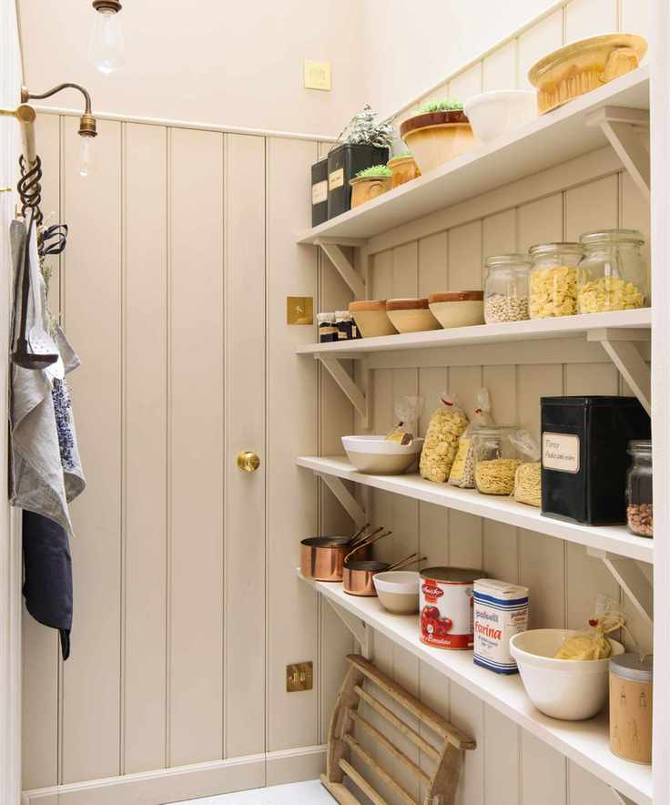 walk in pantry cupboard by devol in a neutral color palette