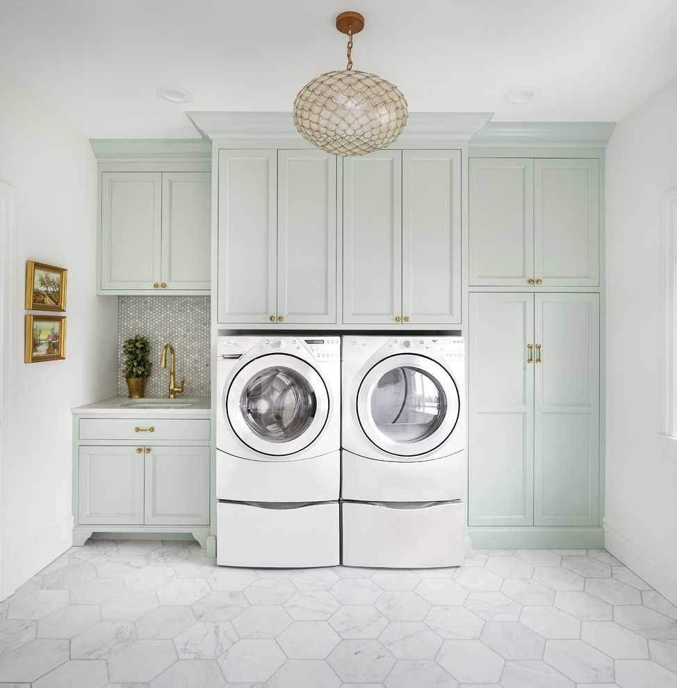 Stylish mint green laundry room cabinetry