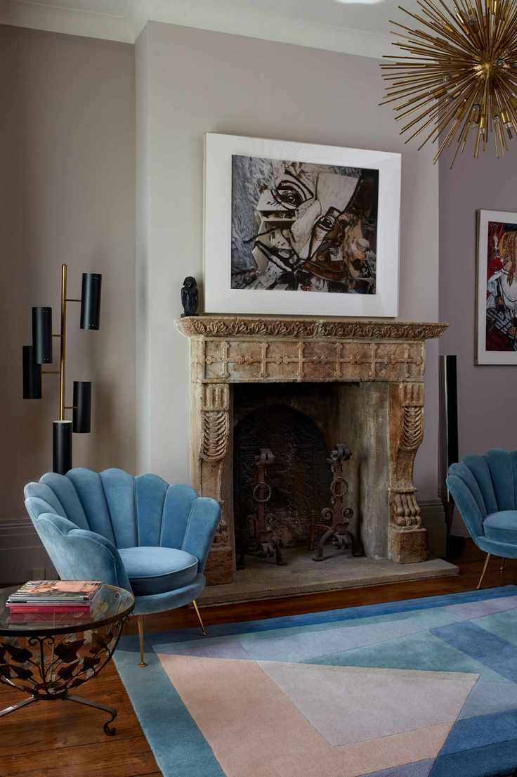 Blue flower chair and matching blue and pink geometric rug