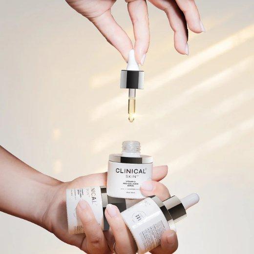 vitamin-c-serum-feature-2.png Vitamin C Pro-Collagen Serum Bottles and Dropper