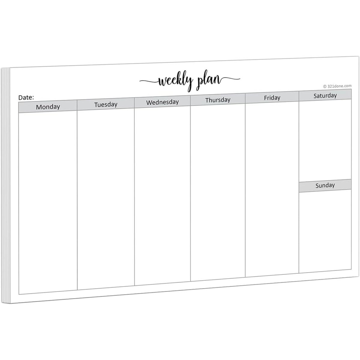 A white weekly paper planner