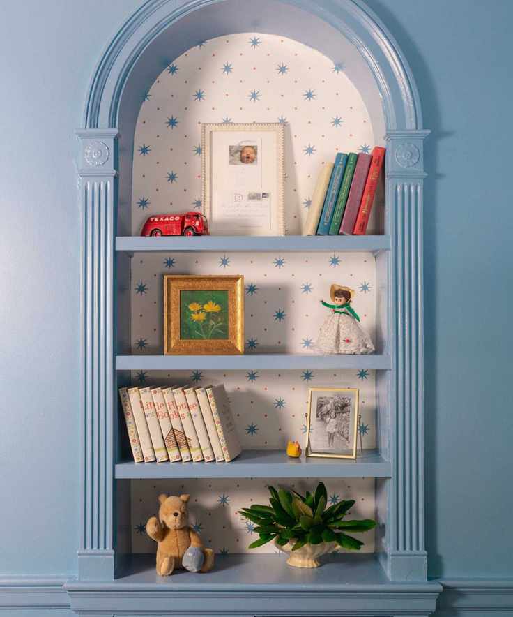 Charming alcove with blue paint and vintage decor