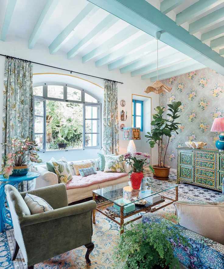 Transitional living room with blue wallpaper