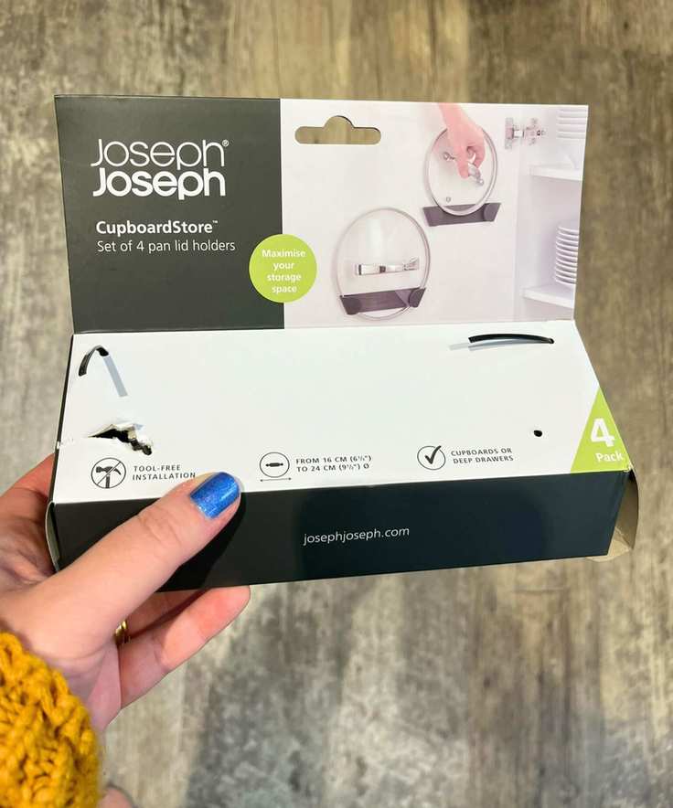 The Joseph Joseph pan lid holders came in a set of four in a small package as pictured in my hand