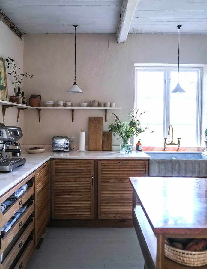 White kitchen with vein style countertops