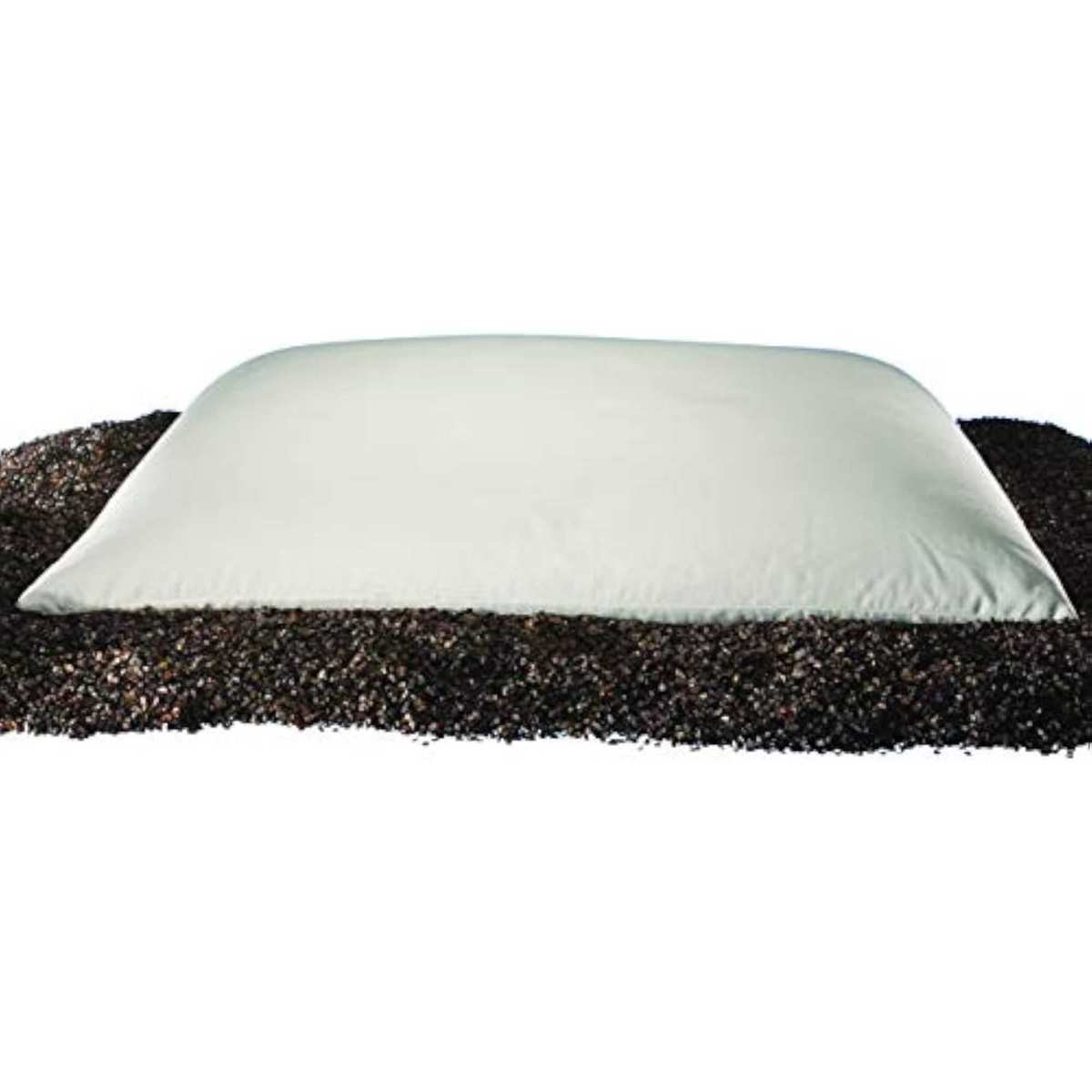 Sobakawa pillow on a pile of buckwheat husks