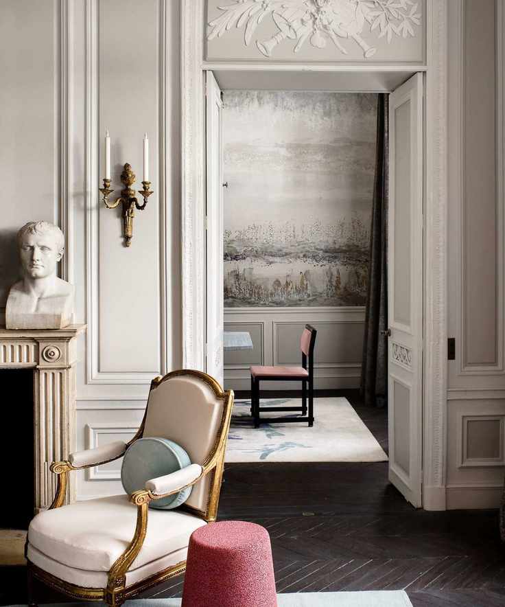 A beautifully styled modern room featuring Regency-inspired decor and vibrant accents