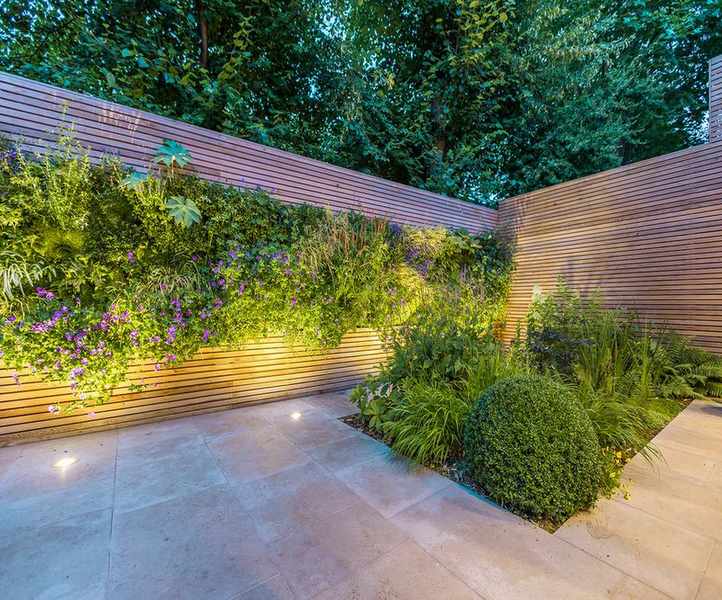 living wall illuminated with garden lighting