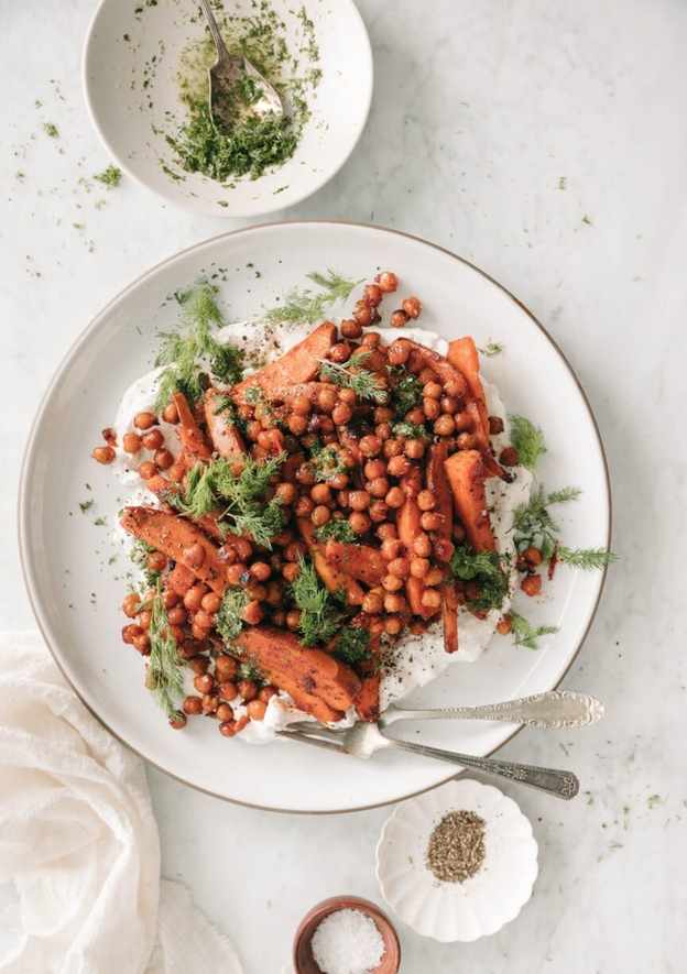 sweet potato chickpea bowl with feta yogurt and herbs