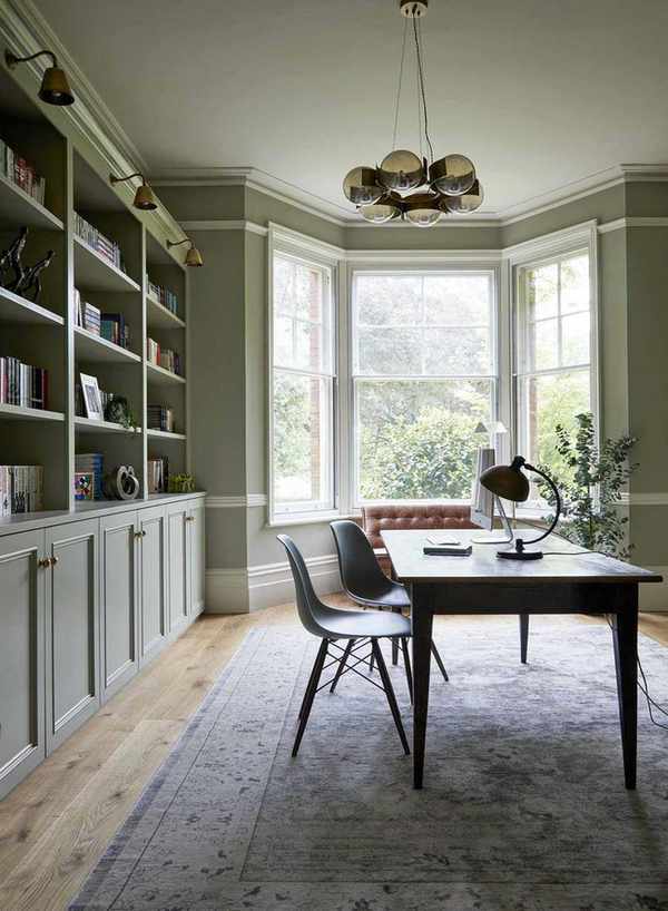 home office in French Gray with bay window and built-in shelving