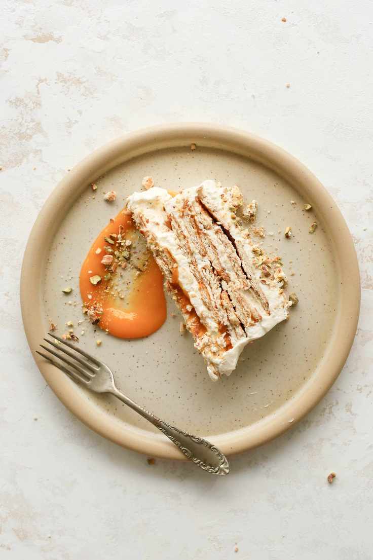 Mango and cardamom cream icebox cake with salty pistachio crumble