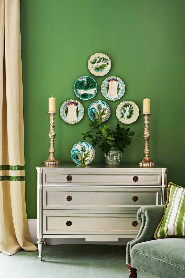 Green living room with plate display