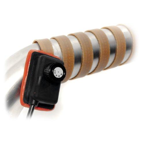 A metal pipes with brown heat tape wrapped around it, a black thermostat control beside it.