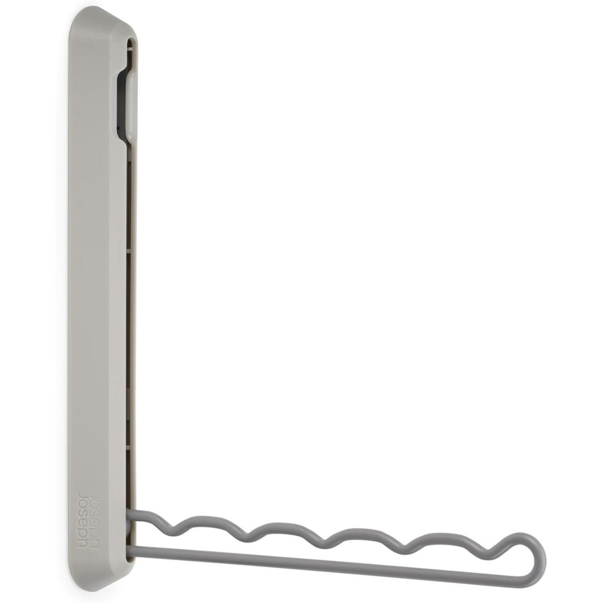 A grey foldaway clothes rail