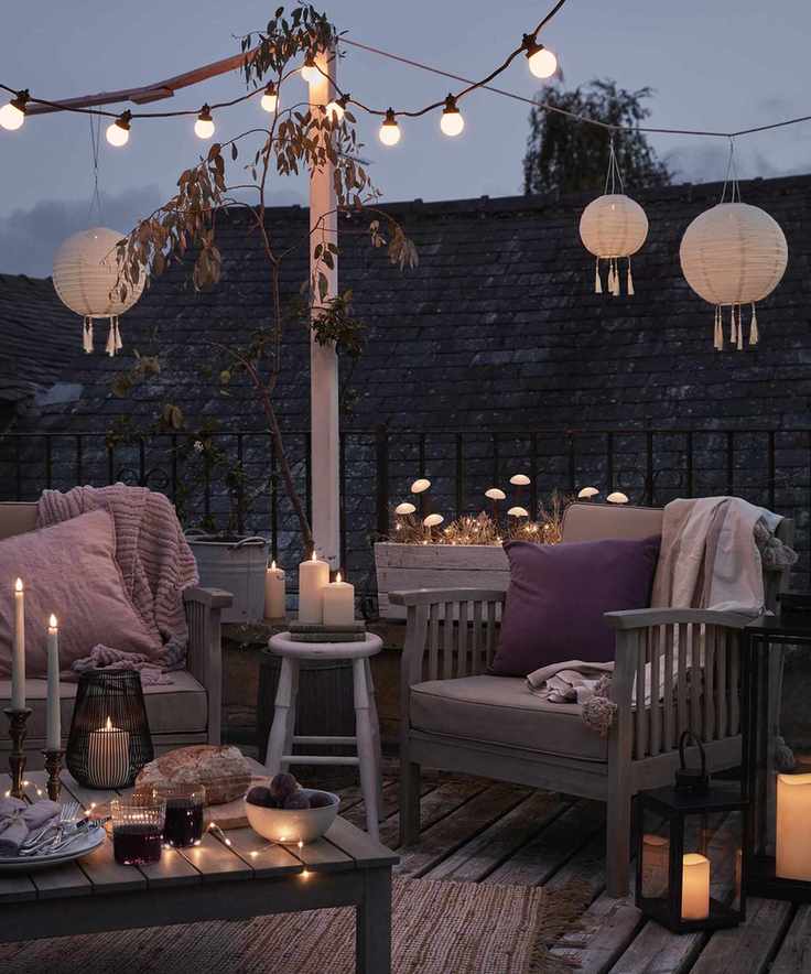 outdoor seating with layered lighting from Lights4fun