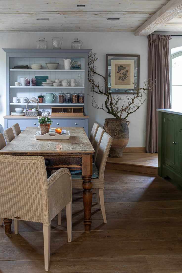 dining area in an open plan kitchen with dresser