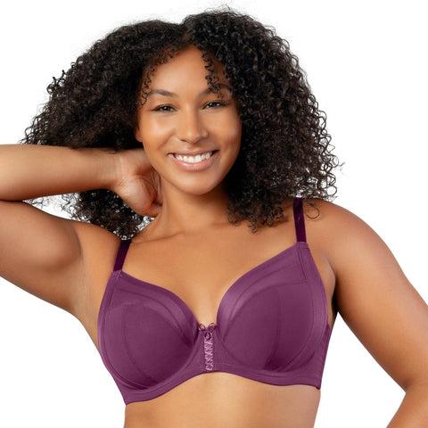 A woman in a purple plunge-neck bra