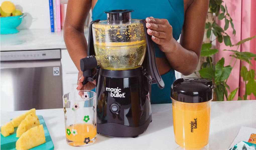 A Magic Bullet Mini Juicer making juice