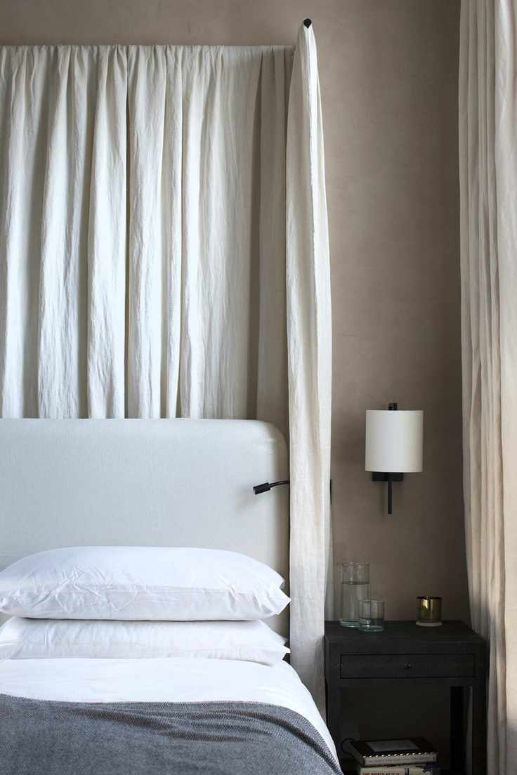 Bedroom by TR Studios with bed canopy by Riley Brooks