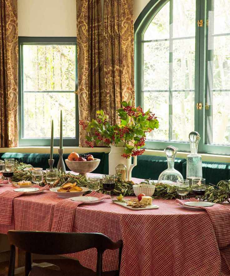 Decorated christmas table with garland and festive decorations