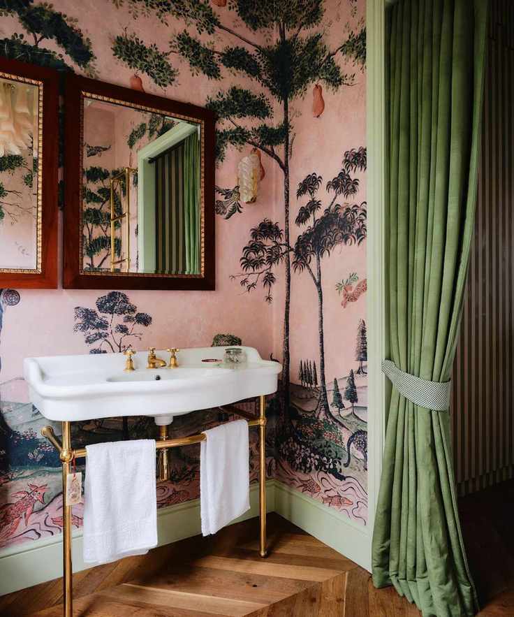 bathroom with pink mural wallpaper