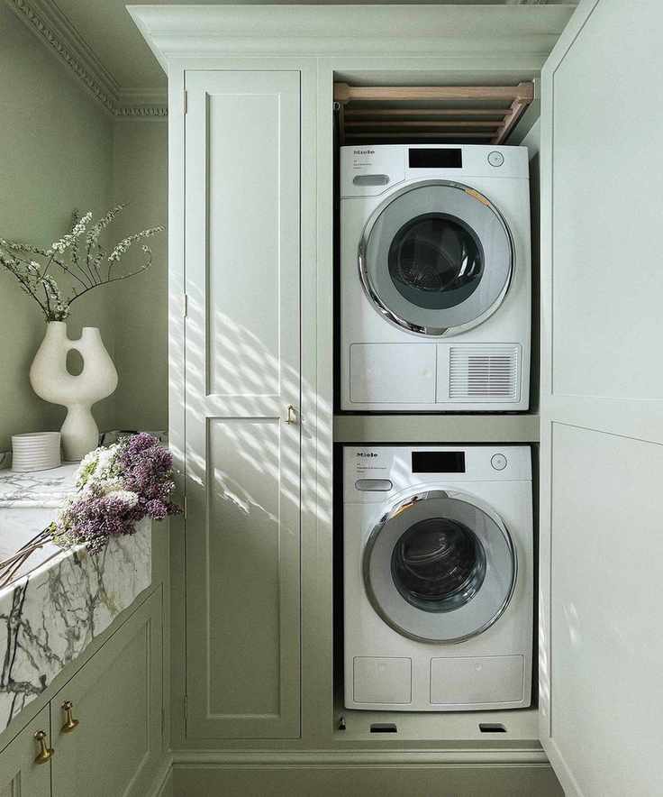 Miele washing machine in a stylish farmhouse modern laundry room