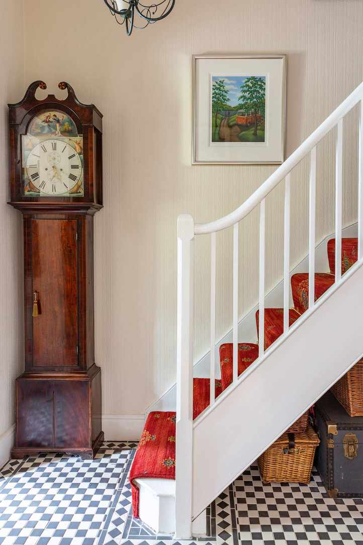 staircase with tiled hallway in cottage staircase ideas