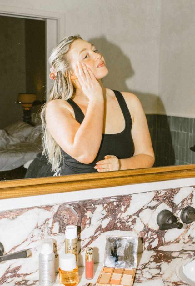 woman applying skincare