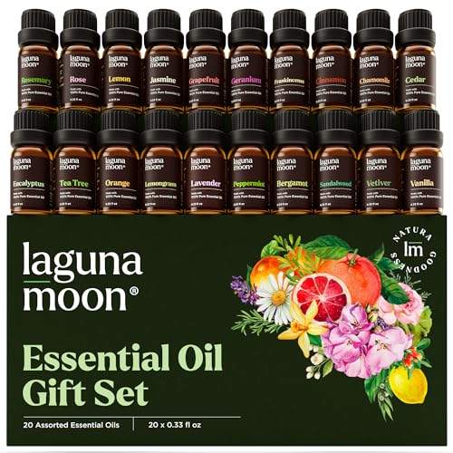 Two rows of small amber glass essential oil bottles on top of a green box.