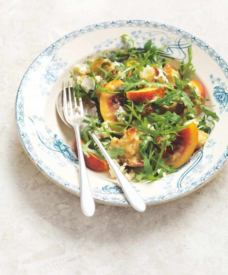 blue cheese, nectarine and rocket salad in a blue and white bowl