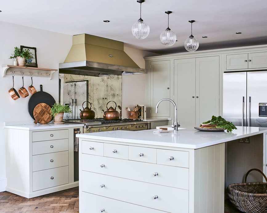 Gold extractor hood in traditional kitchen