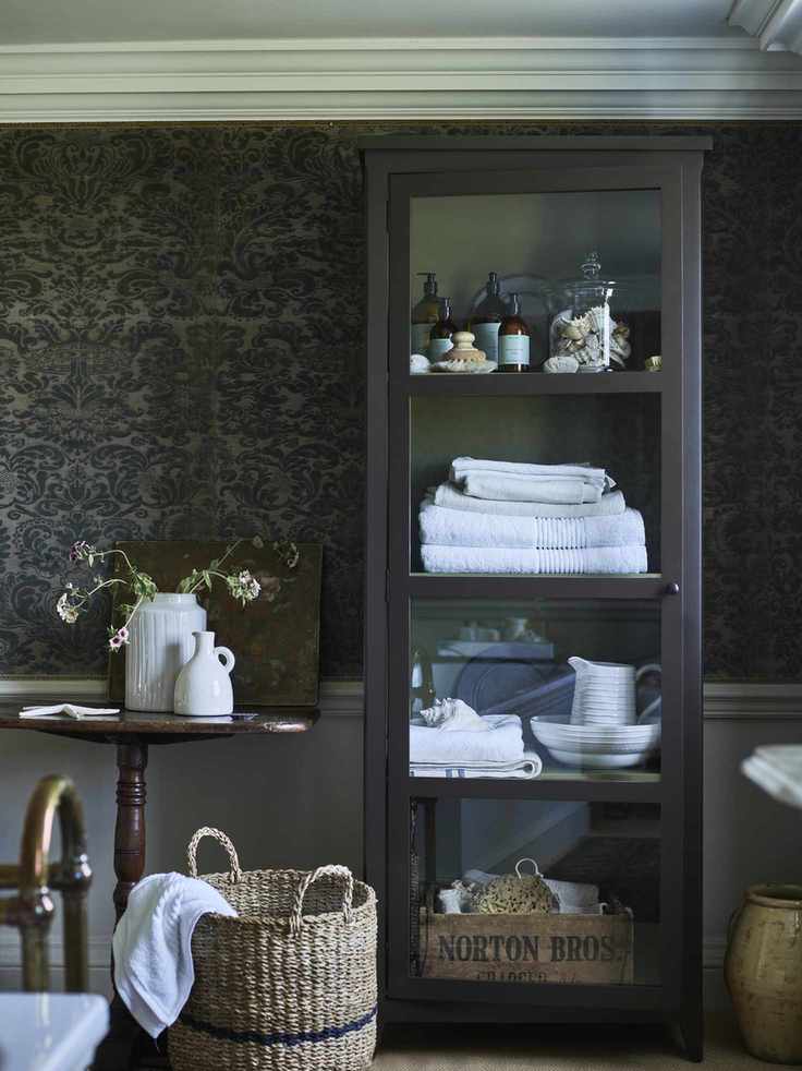 bathroom with glazed cabinet