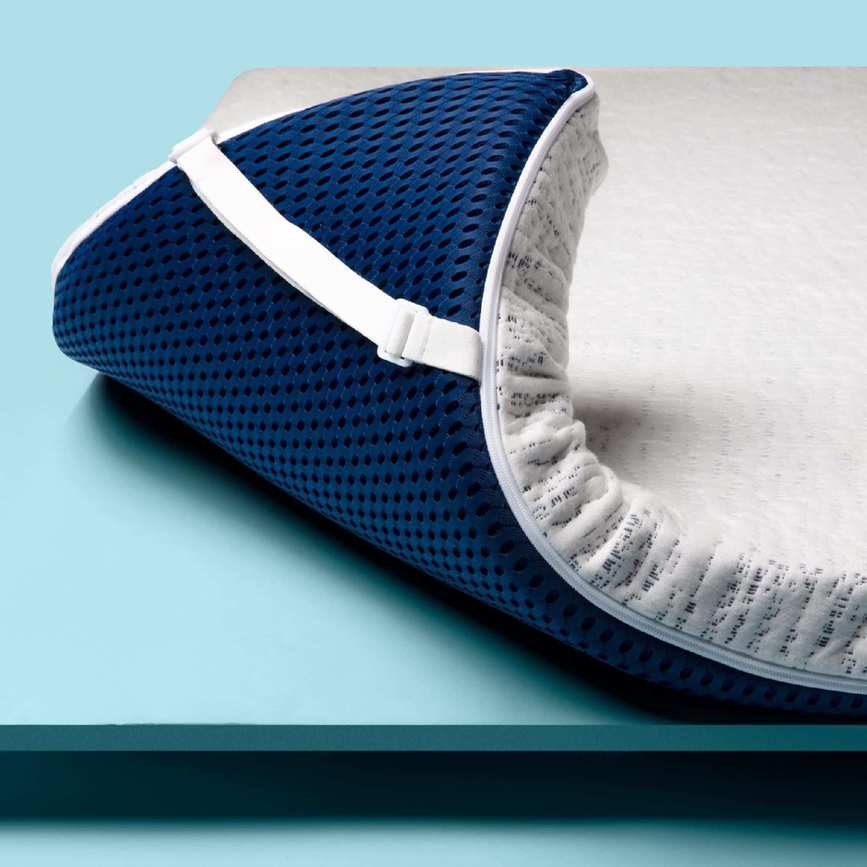 ViscoSoft Select High Density Mattress Topper against a blue background.
