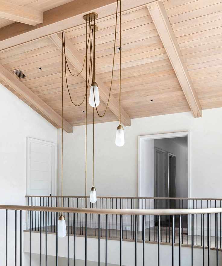 Landing with light wooden ceiling