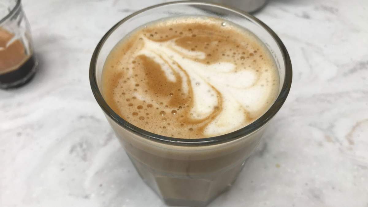 A cup of coffee made with Breville Bambino Plus