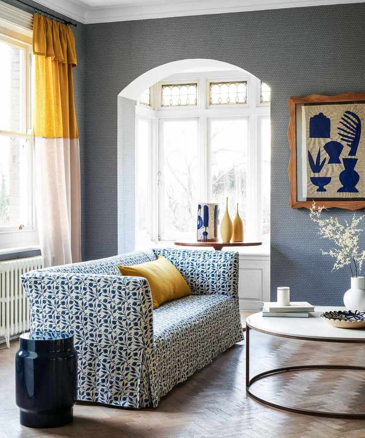 Living room with blue and yellow color scheme