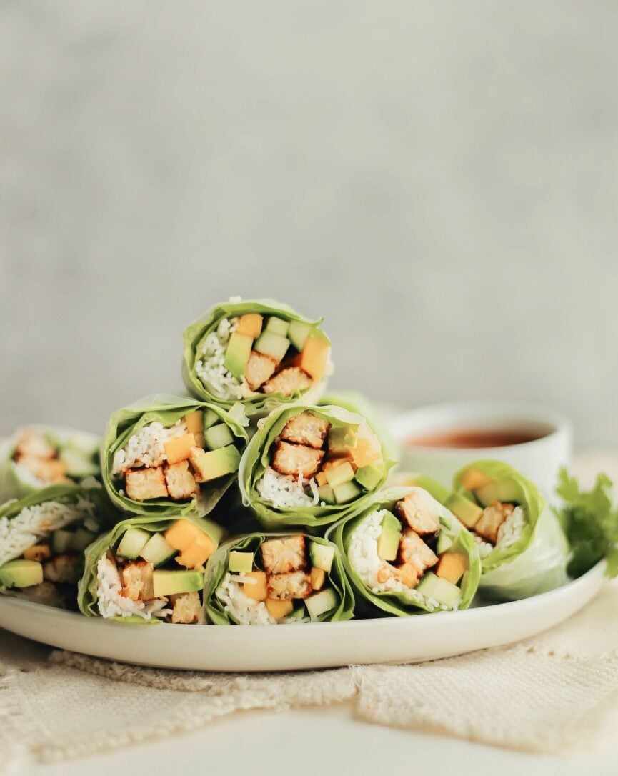 honey sriracha tempeh spring rolls stacked