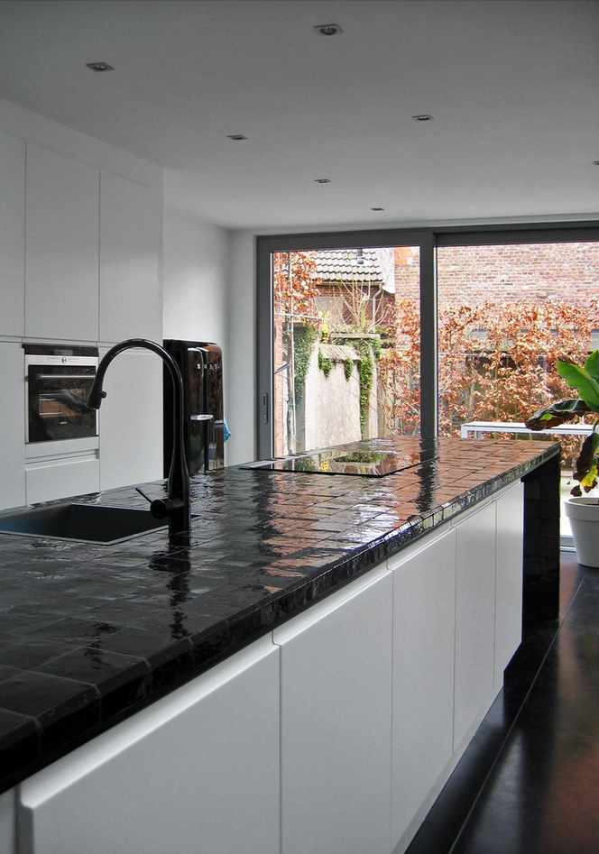 Black tiled kitchen island
