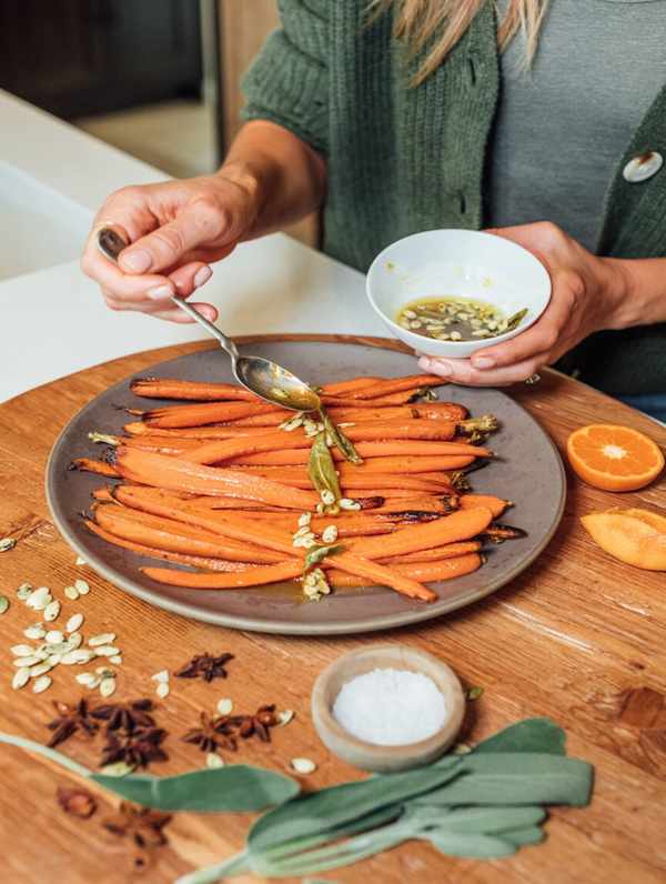 honey roasted carrots with spicy citrus, sage, and pepitas