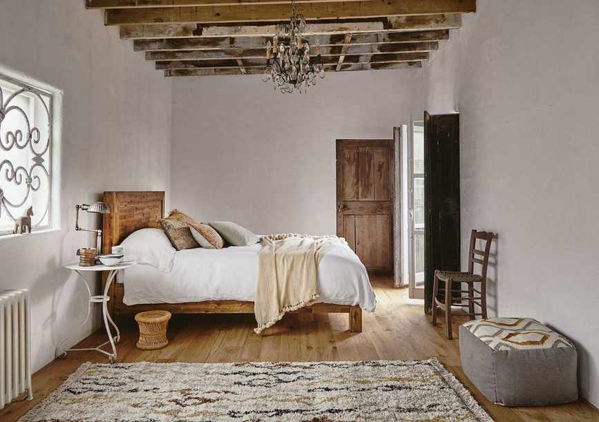 Rug in a rustic bedroom