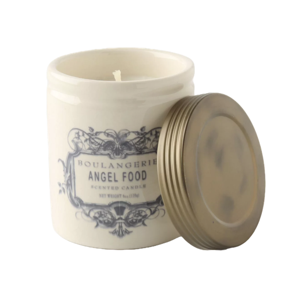 the 'angel food' scented candle from Anthropologie: a cream colored mason jar with a white candle inside, with the lid off to the side