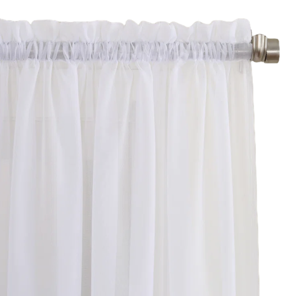 a close up of white sheer curtains on a metal curtain rod