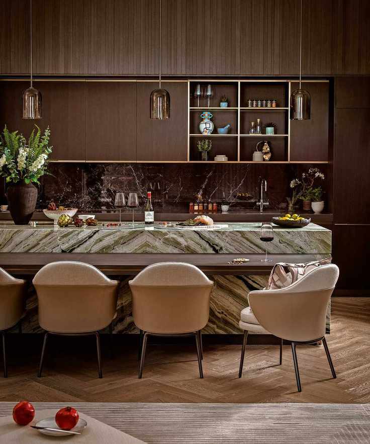 Brown kitchen with wood cabinets and marble surface