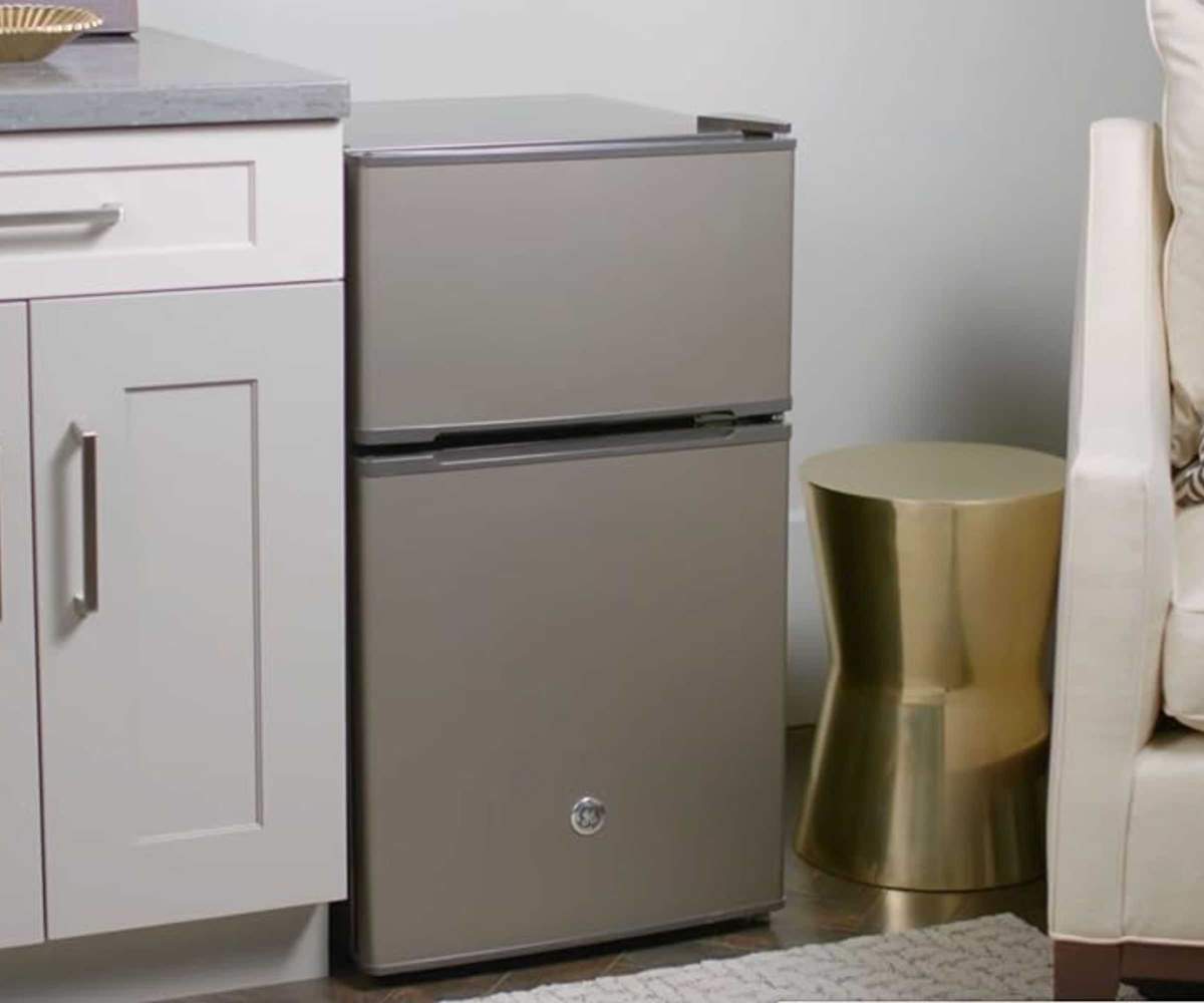 GE Double Door Mini Fridge in a lounge