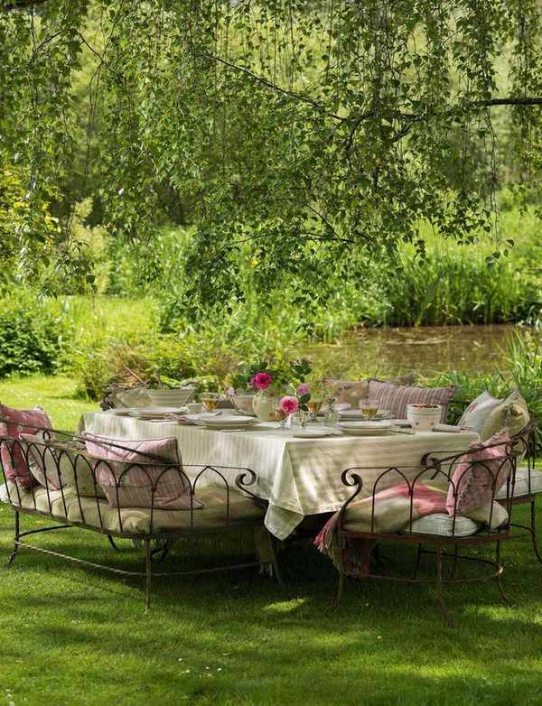 Susie Watson Designs garden furniture underneath shade tree