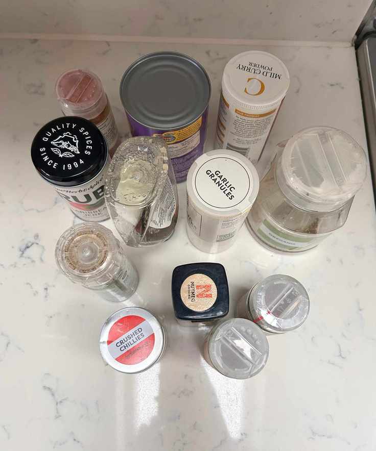 Odd spices on a white kitchen countertop
